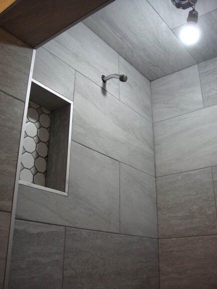 custom shower with tiled ceiling