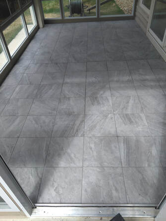 Tile installed on concrete floor in a sun room